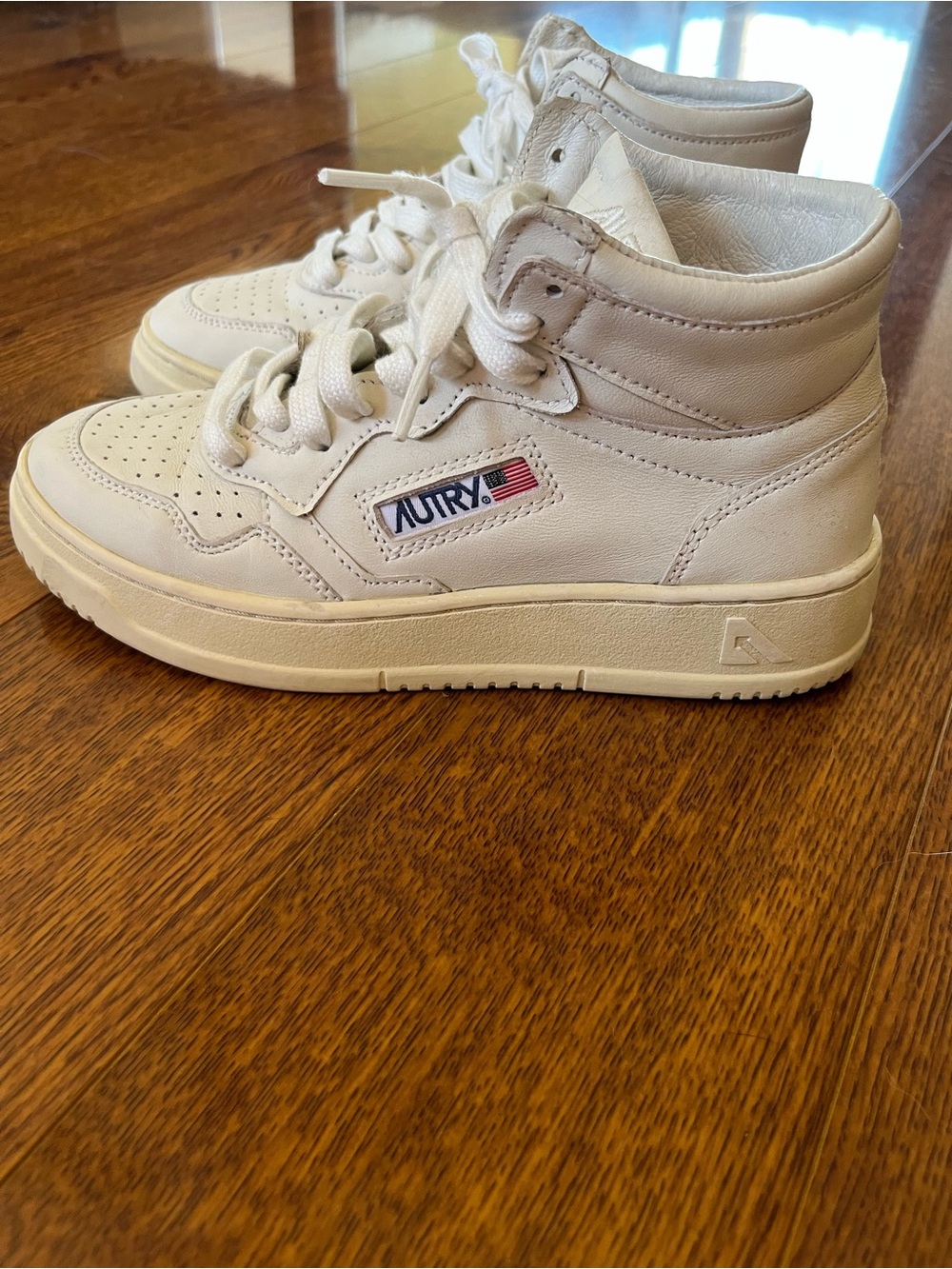 Autry High-Top Leather Sneakers in Off-White